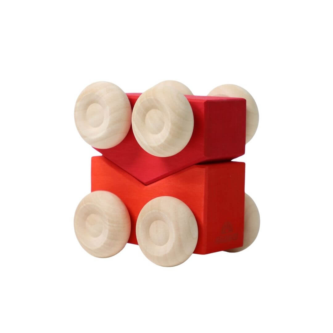 The red and orange colorful wooden stacking cars by Grimm’s, handcrafted in assorted rainbow hues for open-ended play and building fun - Bella Luna Toys