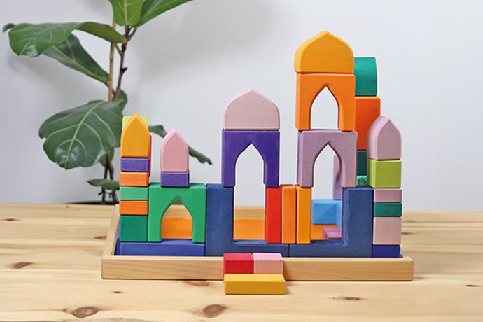Grimm's Wooden Building Blocks on wooden table