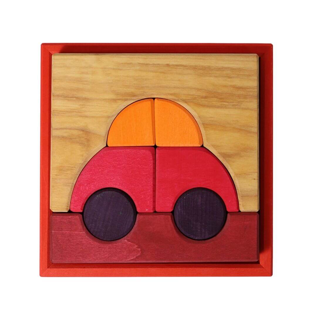 Grimm’s Wooden Puzzle and Building Set in red, featuring a bright wooden car design with circular wheels and curved pieces inside a square red frame. Bella Luna Toys