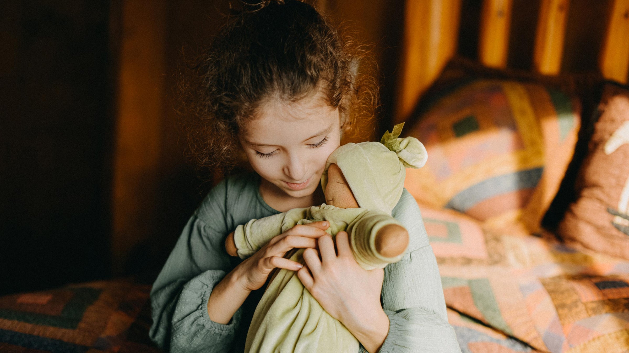 Girl with Bella Luna Toys Heavy Baby