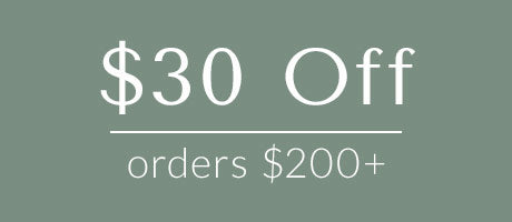 Promotional text indicating $30 off for orders over $200 on a green background