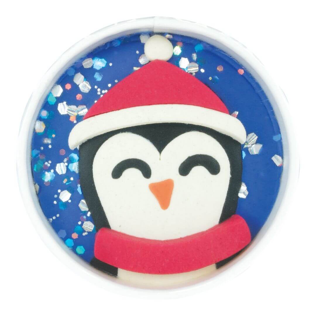 Land of Dough Polar Penguin features frosty blue, glittery play dough topped with a cozy penguin friend. Silky-soft, wintery sensory play made in the USA. Bella Luna Toys