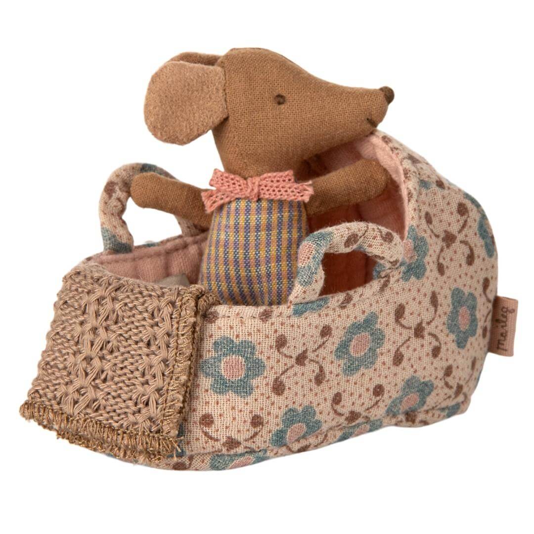 Maileg baby mouse carrycot in a rose floral pattern with tiny handles and a soft quilted interior with a baby mouse inside- Bella Luna Toys
