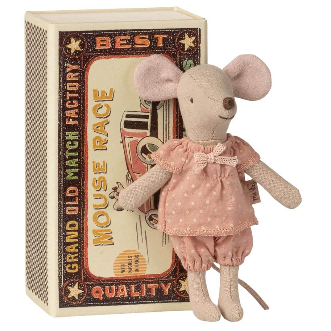 Maileg Big Sister Mouse wearing soft pink polka dotted pajamas, standing beside her vintage-style matchbox bed. - Bella Luna Toys