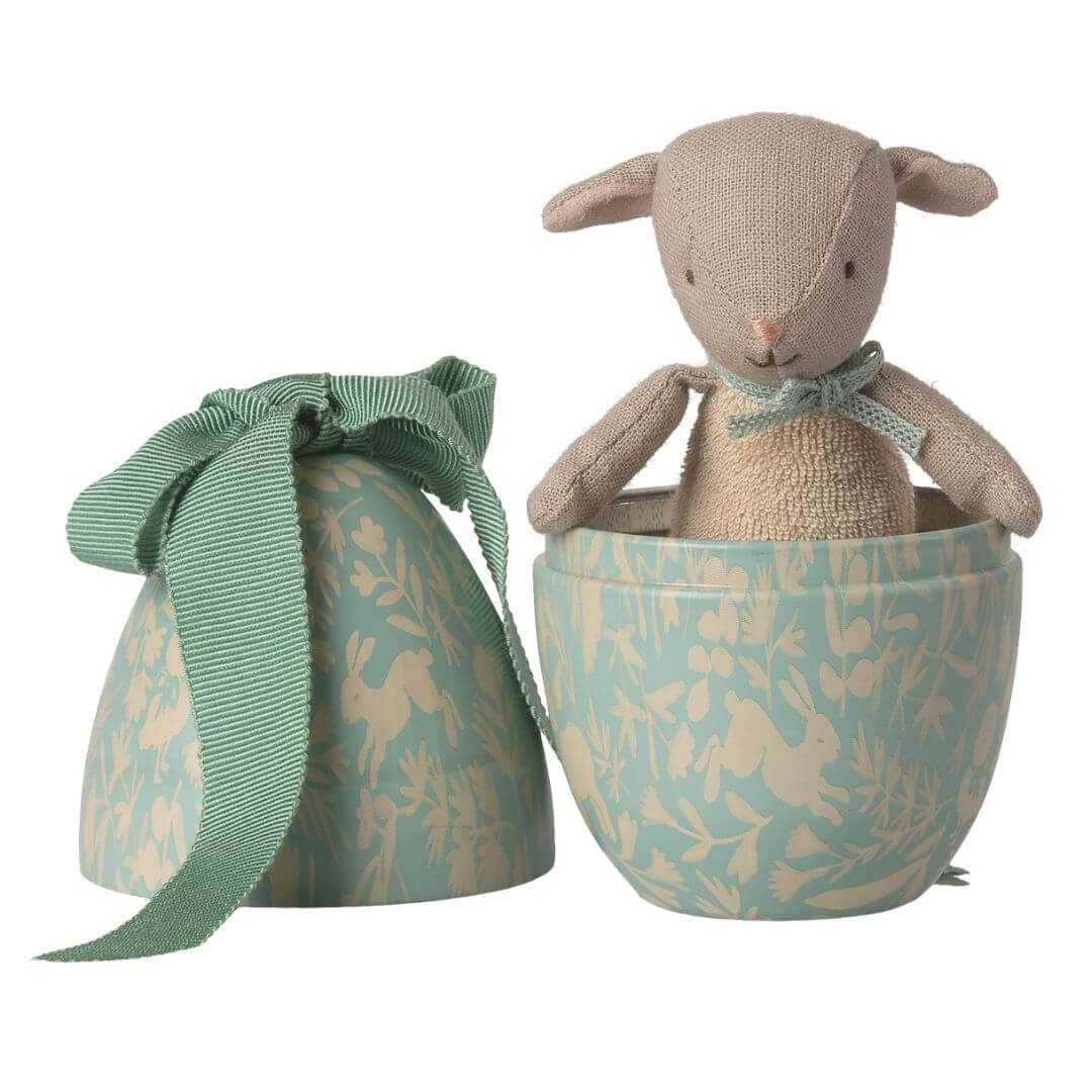 Maileg mint metal Easter egg with floral pattern and ribbon bow, featuring small stuffed lamb inside