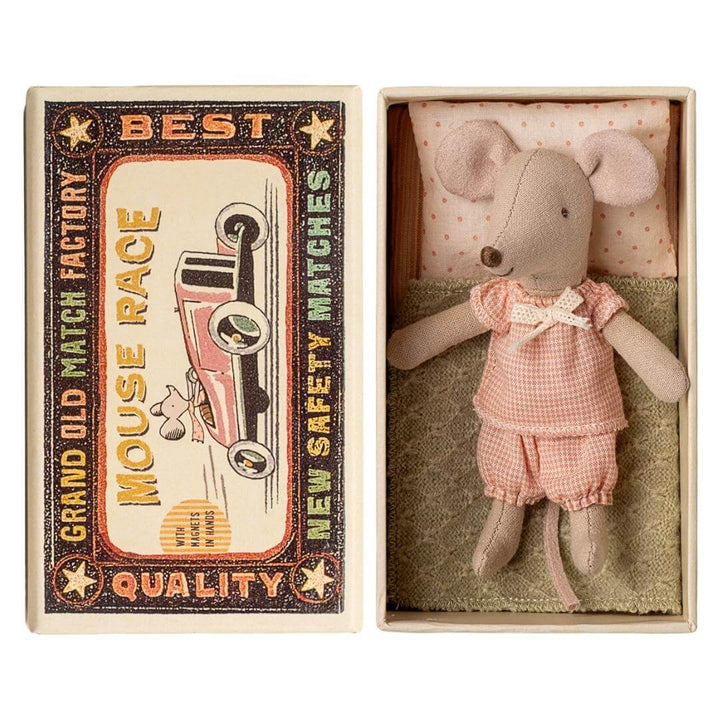 Maileg - Little sister mouse in matchbox wearing gingham pajamas and laying on top of the linens within the matchbox - Bella Luna Toys