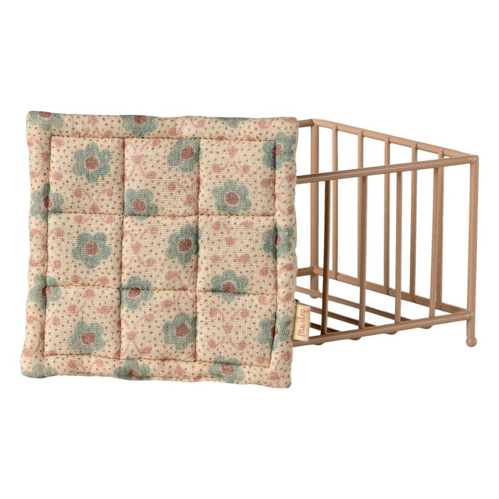 Floral blanket that comes with the Maileg mouse sized play pen for dollhouses in a pink colorway.