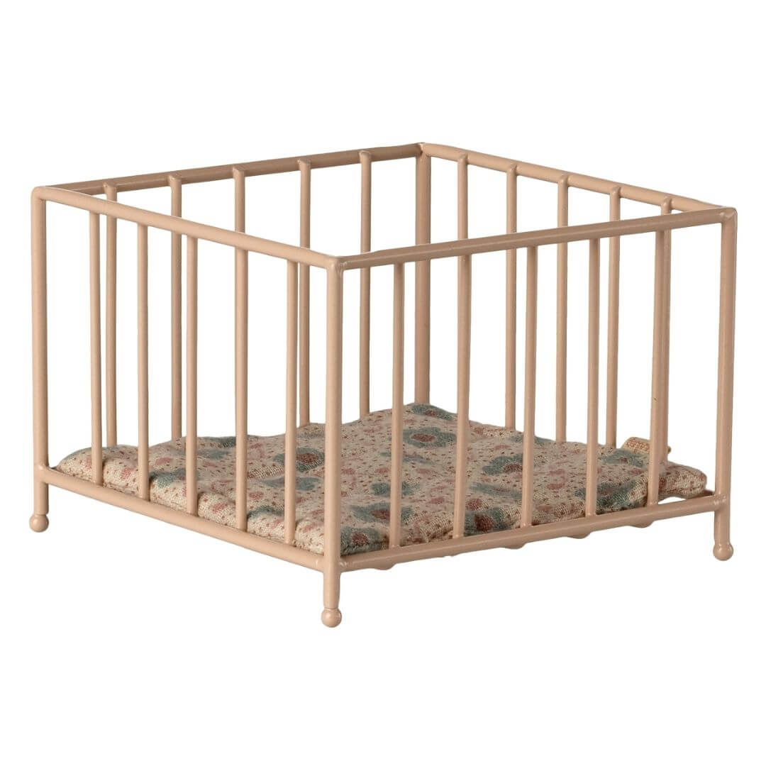 Maileg mouse sized play pen for dollhouses in a pink colorway.