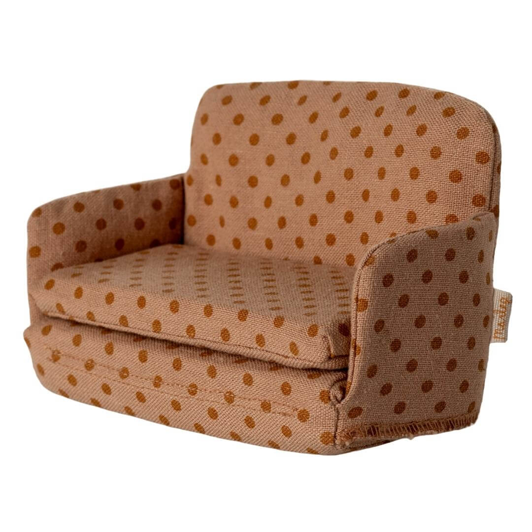 Maileg mouse-sized sofa bed in peach polka dotted fabric, cozy dollhouse furniture from Bella Luna Toys.