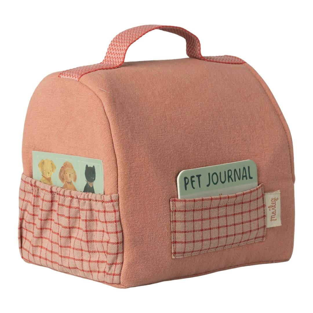 Maileg pet carrier in coral fabric with handle, front and side pockets, including pet journal ID card for Maileg puppies and animals. - Bella Luna Toys