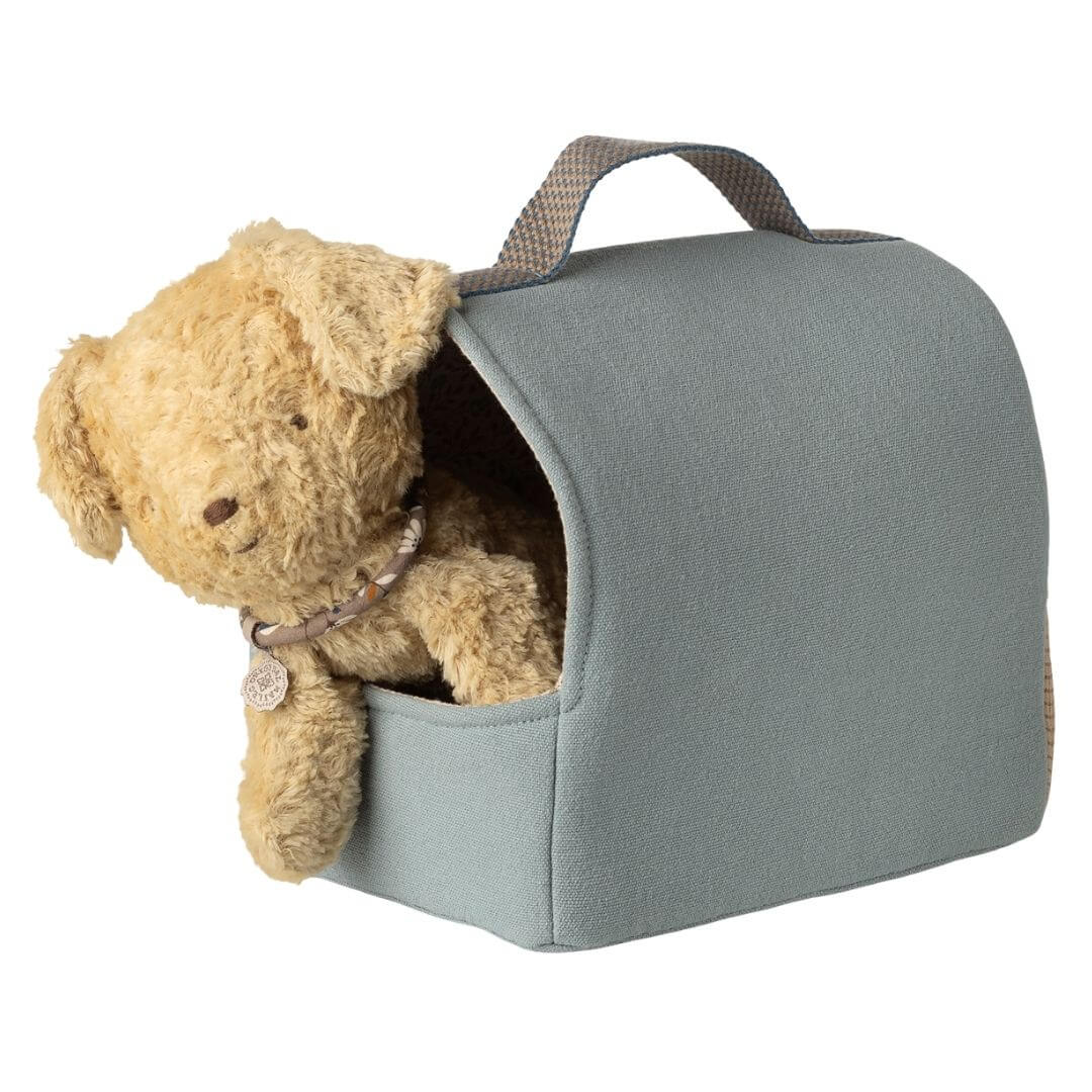 Maileg pet carrier in dusty blue fabric with handle, front and side pockets, with puppy peeking out. - Bella Luna Toys