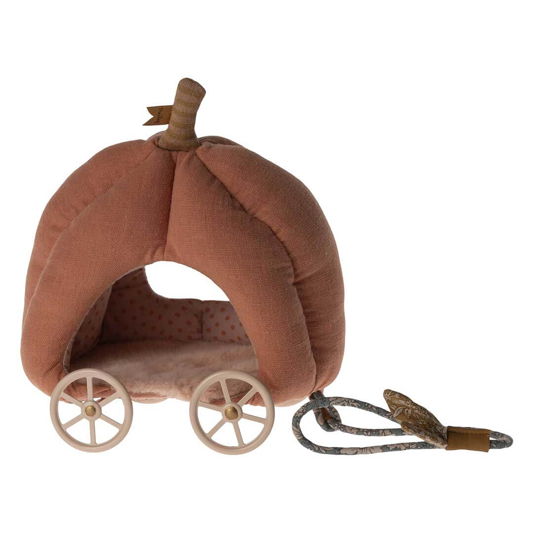 Maileg Pumpkin Carriage for Mice in orange plush with 4 white wheels, a striped stem, polka dotted interior, and floral string to pull