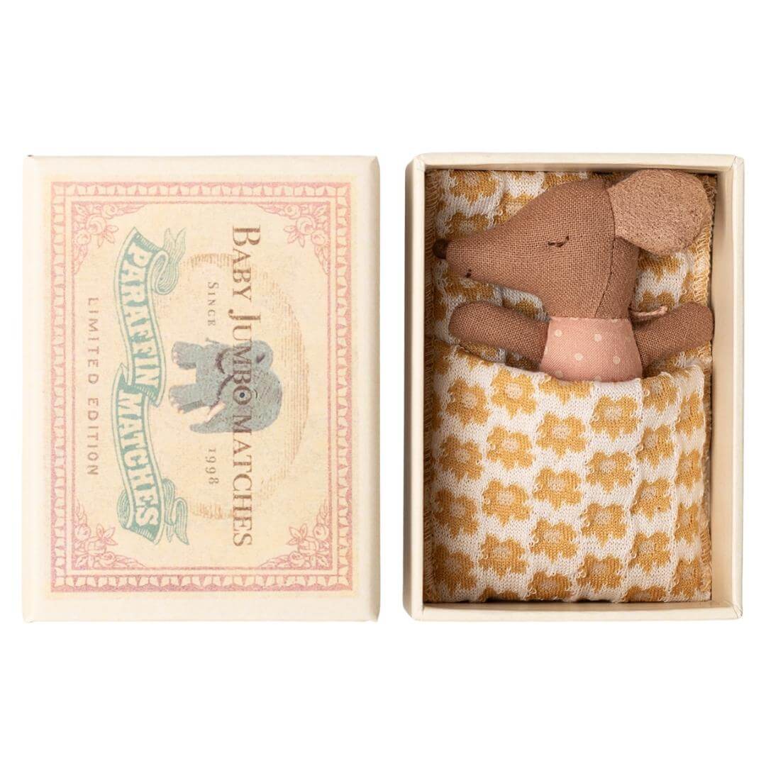 Maileg - Pink Sleepy Wakey Baby Mouse in matchbox tucked in on the sleepy side with a yellow floral blanket- Bella Luna Toys