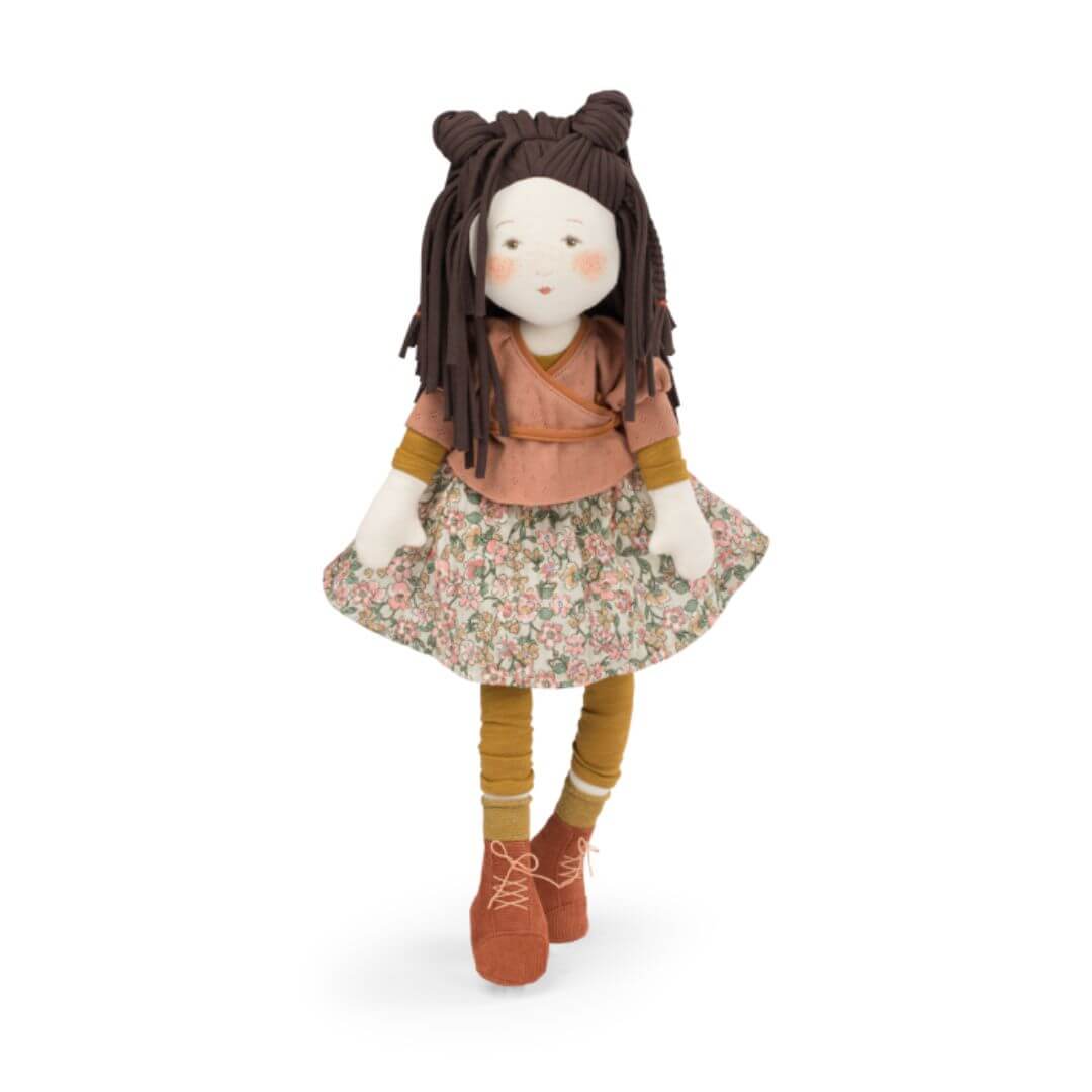 Moulin Roty Marjolaine doll with brown hair and floral outfit.