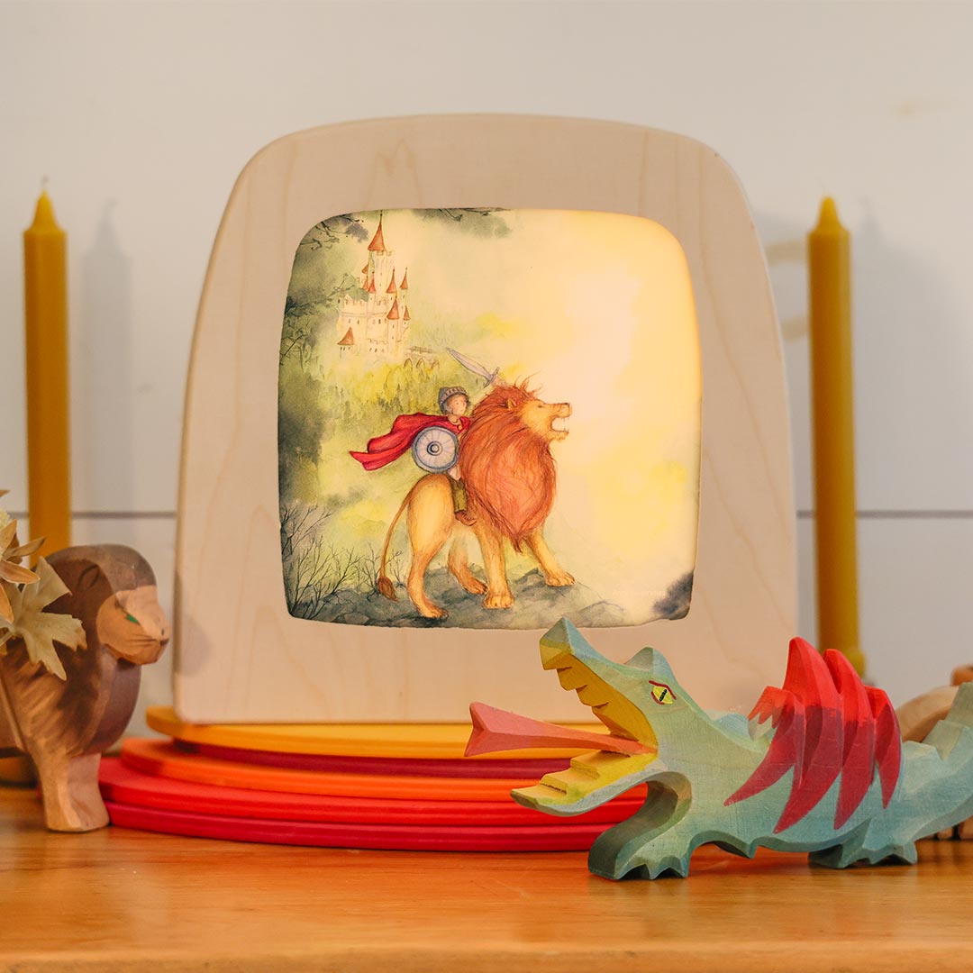 A Michalemas Toverlux lamp on a decorated table.