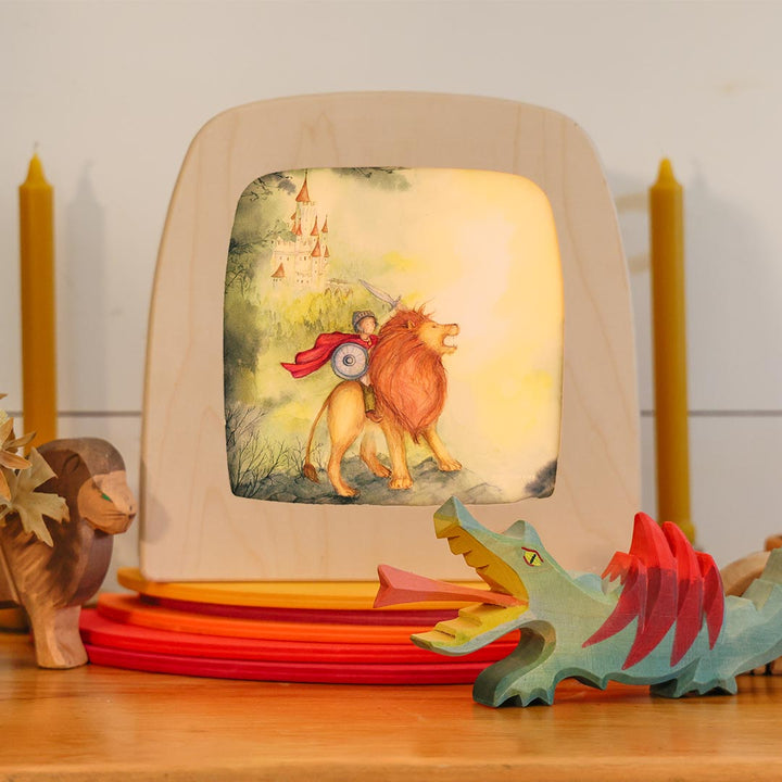 A Michalemas Toverlux lamp on a decorated table.