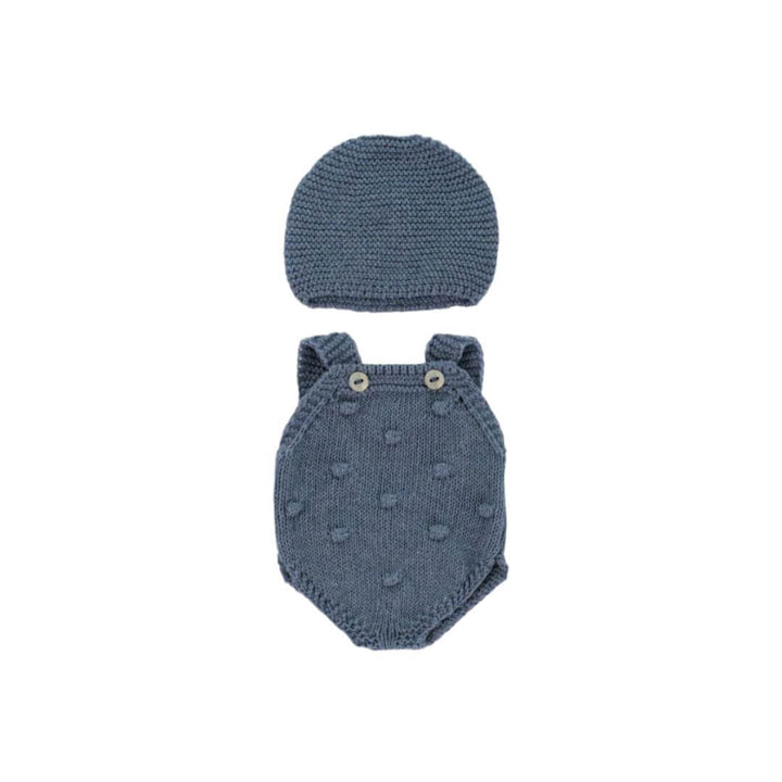Blue knit romper with button straps and matching bonnet for 12-inch Miniland dolls, made from recycled materials with a handcrafted look.