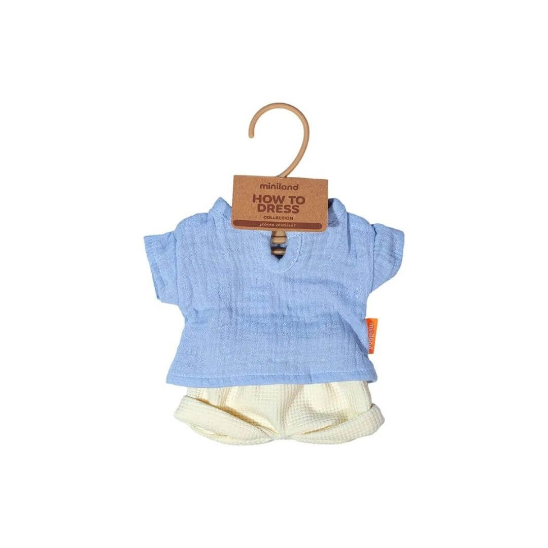 Miniland - Warm Weather Doll Outfit - 12" with blue shirt and white shorts on a hanger against a white background - Bella Luna Toys