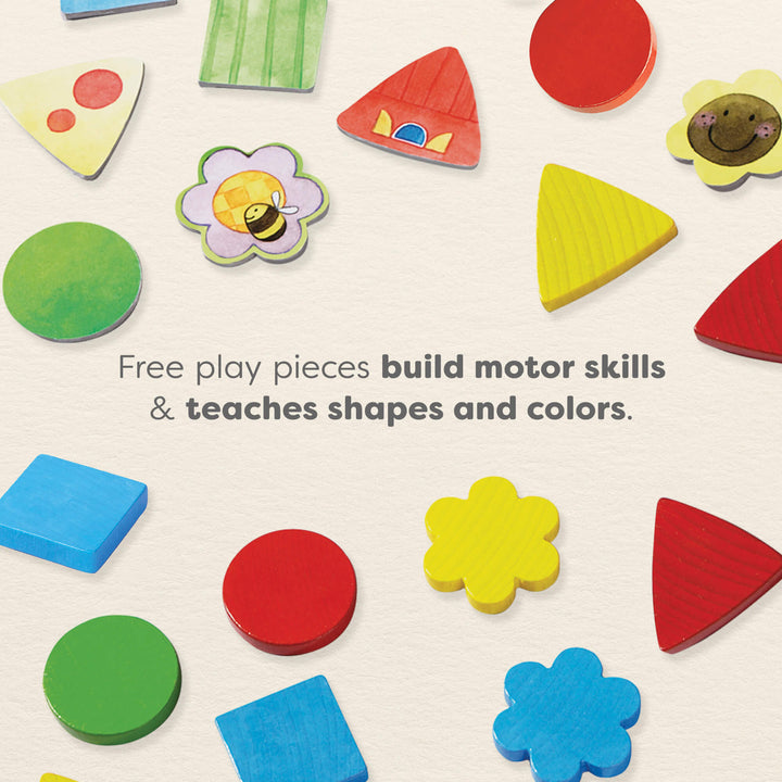 Colorful wooden play pieces. Text reads "Free play pieces build motor skills & teaches shapes and colors."