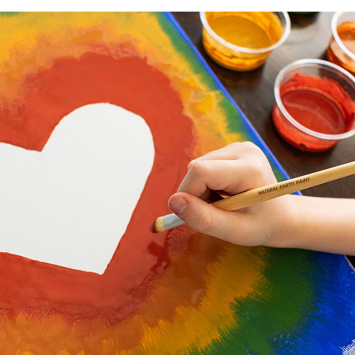 Natural Earth Paint Kit- Arts and Crafts-Child painting a rainbow heart- Bella Luna Toys