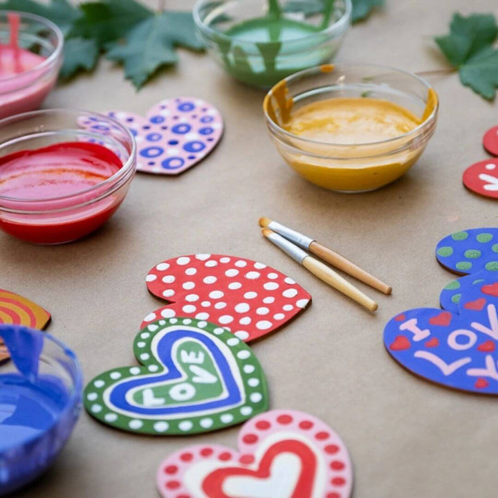 Painted wooden hearts from the Natural Valentine's craft kit.