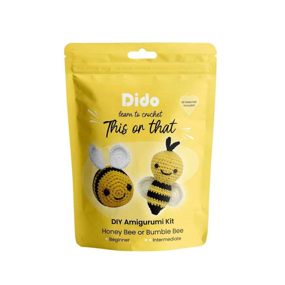 A yellow stand-up pouch package for a DIY Amigurumi Kit, featuring crocheted bee designs on the front. The brand name 'Dido' is clearly visible at the top.