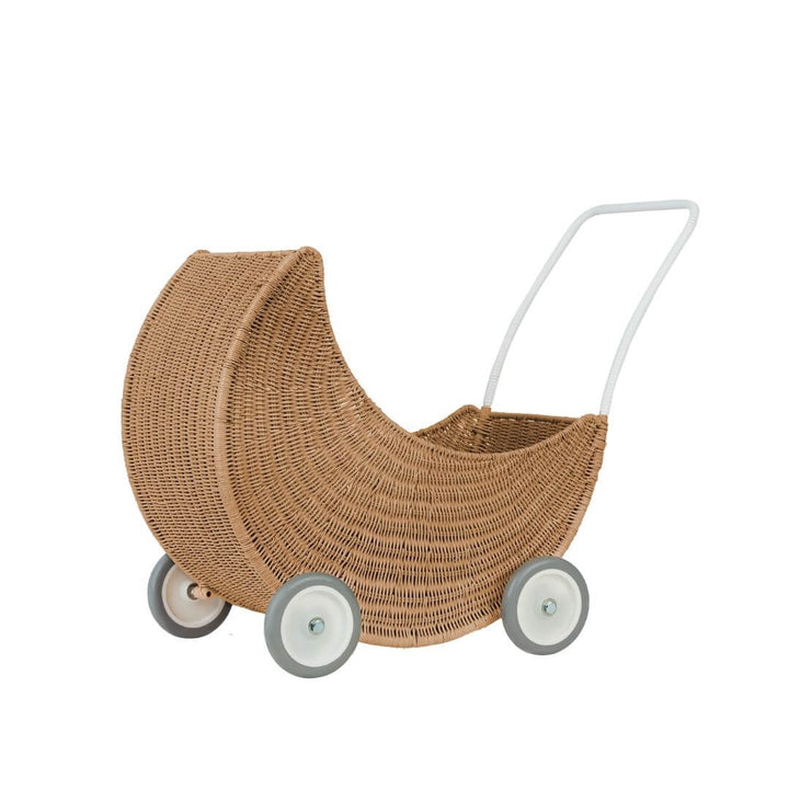 Olli Ella Natural Moon Strolley – a woven rattan doll stroller with a curved moon-shaped design and white wheels, perfect for imaginative play and display.