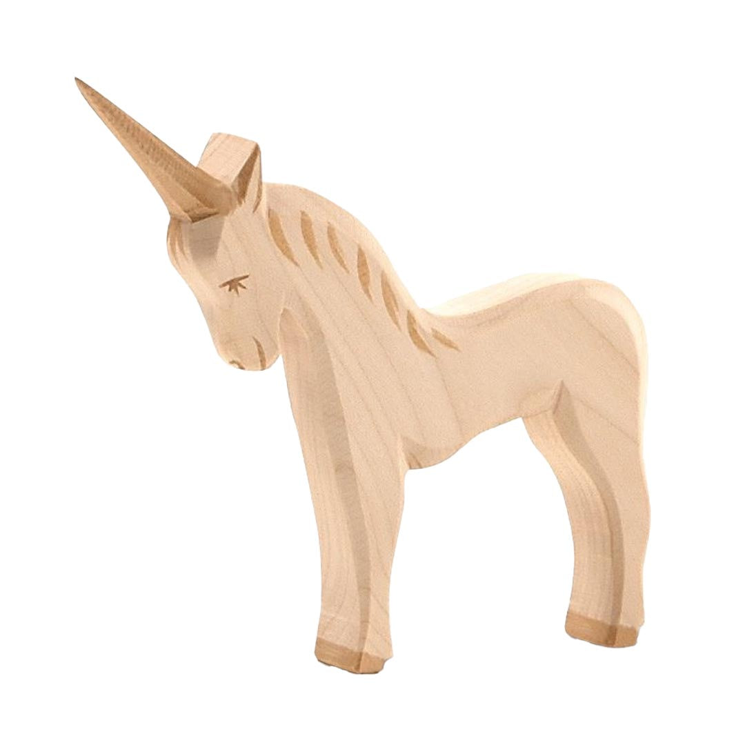 Wooden unicorn figurine from Ostheimer on a white background.