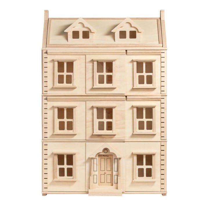 Four-story PlanToys Grand Victorian Wooden Dollhouse with opening windows, detailed trim, and an attic level, crafted in a classic natural wood finish. Bella Luna Toys