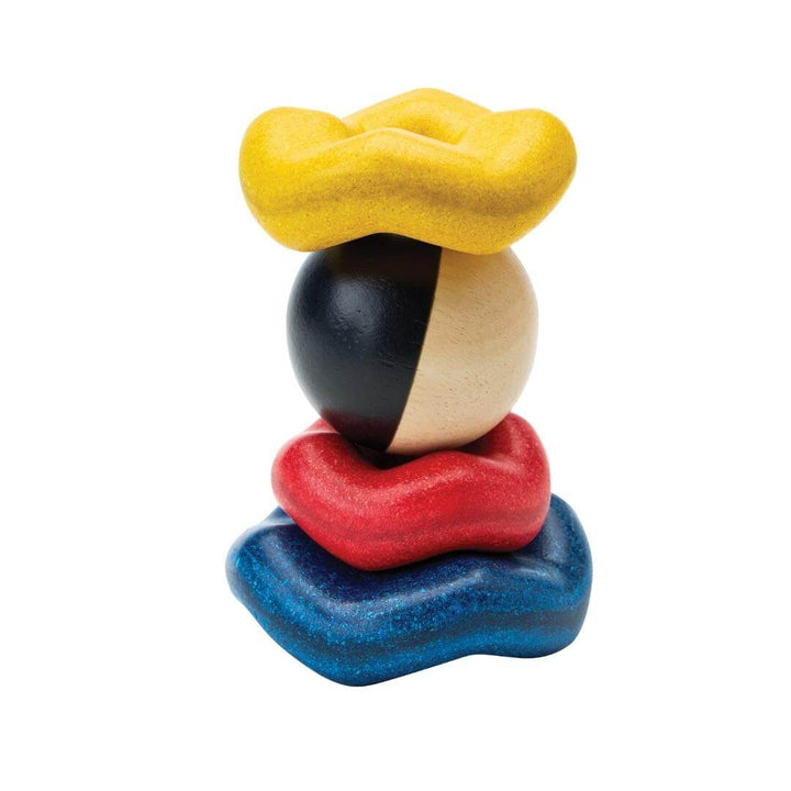 PlanToys Montessori Ball and Wave Stacker with wooden ball topper and three colorful wave-shaped pieces made from eco-friendly PlanWood®.