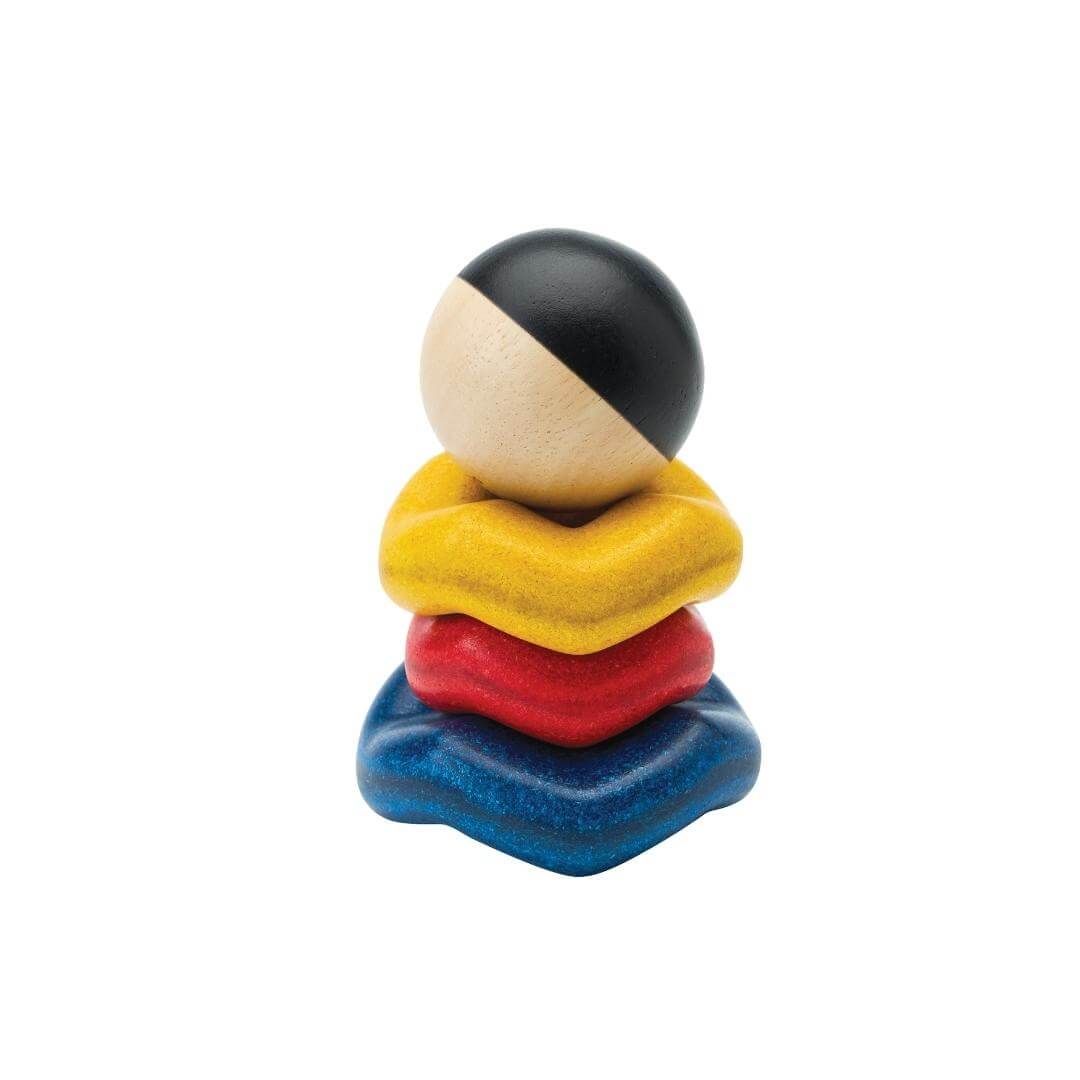 PlanToys Montessori Ball and Wave Stacker with wooden ball topper and three colorful wave-shaped pieces made from eco-friendly PlanWood®.