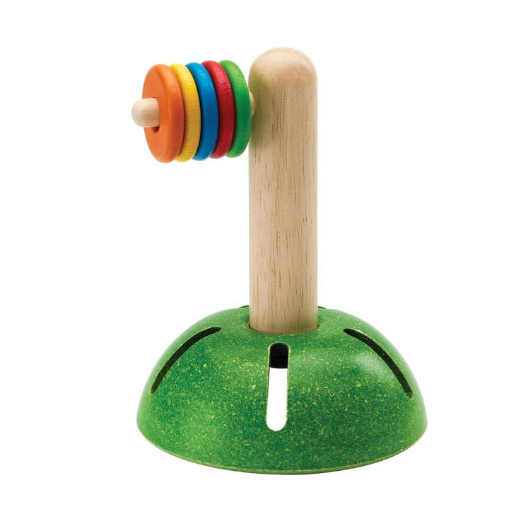 PlanToys Horizontal Stacking Set with colorful wooden discs on a vertical post and green base.
