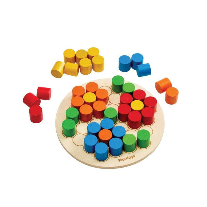 PlanToys Montessori Peg Board Set with colorful pegs and a board showing a few flower-shaped peg patterns.