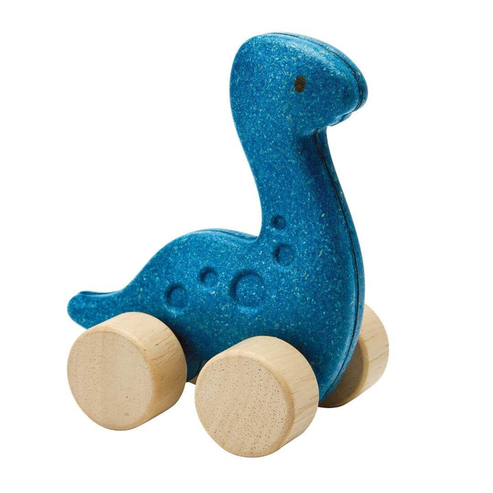 PlanToys Montessori Dino Diplo Car in blue, shaped like a Diplodocus with four natural wooden wheels, designed for toddlers to push and roll.