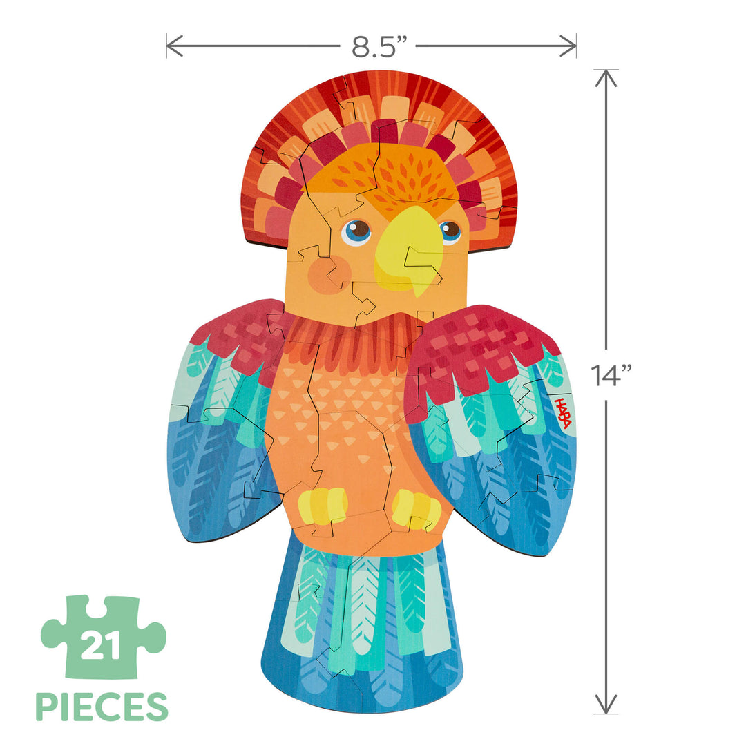 Parrot-shaped 21-piece puzzle with colorful patterns in red and blue, measuring 8.5 by 14 inches.
