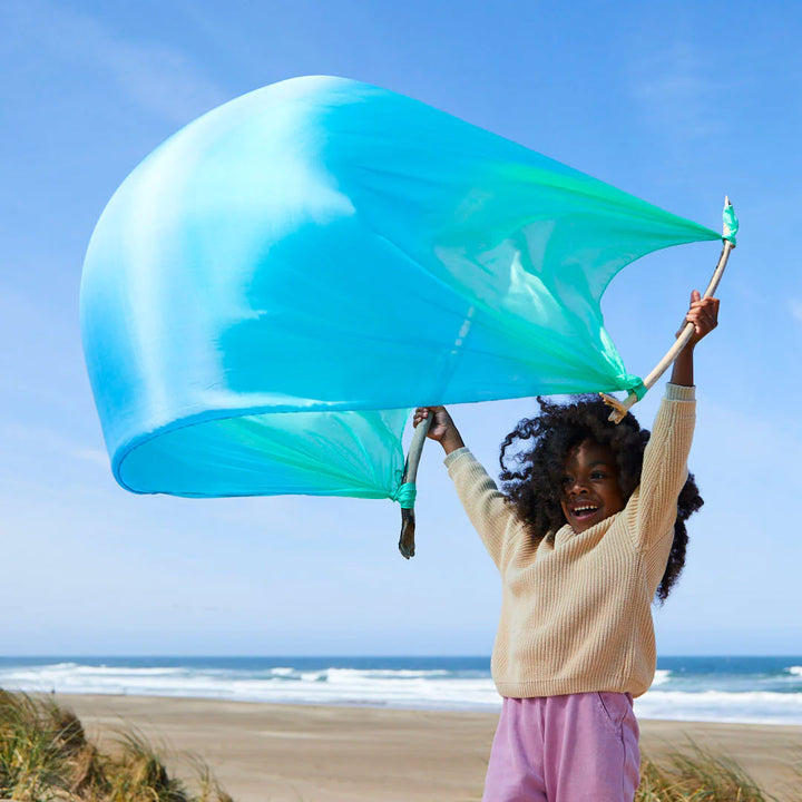 Sarah's Silks Giant Playsilk in Sea with child playing