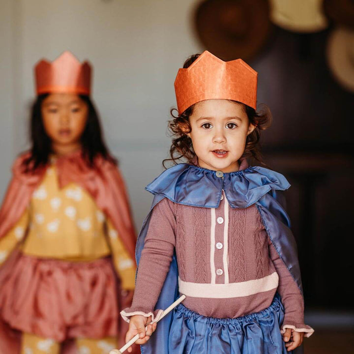 Child wearing Sarah's Silks Northern Coast Playsilk crown and cape with tutu