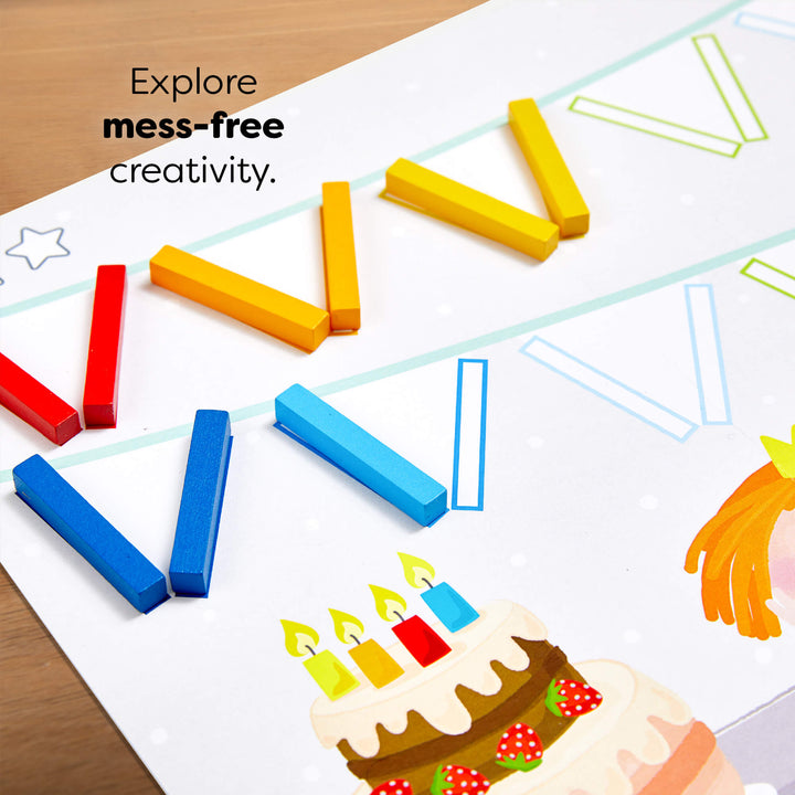 Colorful template with wood sticks and an illustration of a cake. test reads "Explore mess-free creativity."