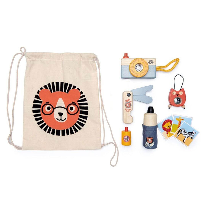 Canvas drawstring bag with a bear design, accompanied by various small items on a white background.