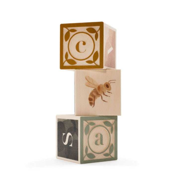 3 ABC blocks from uncle goose stacked up featuring "c", "a" and a bee.