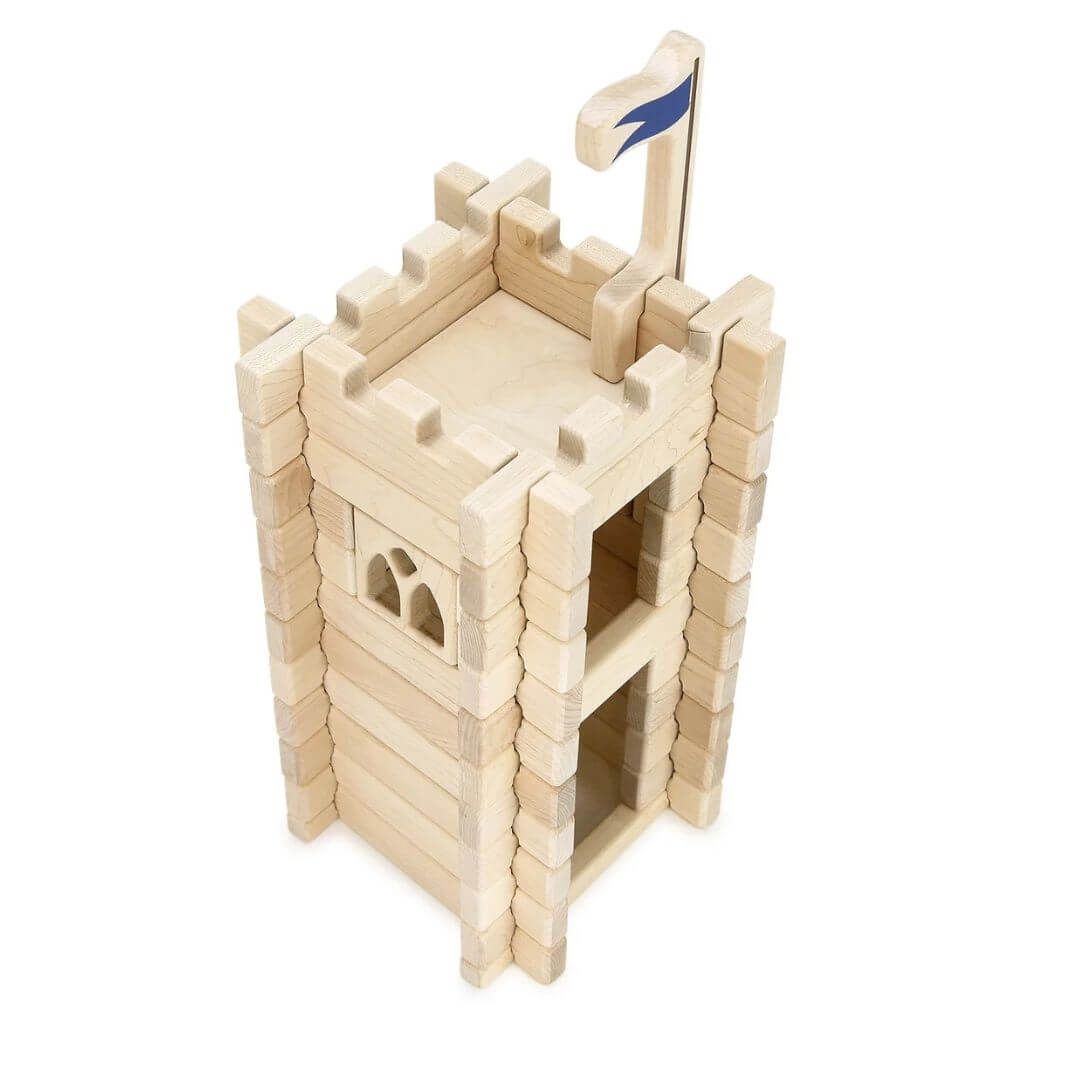 Overhead view of the Everwood Friends Wooden Notch Blocks Castle Tower Set featuring 64 interlocking wooden blocks in 12 shapes that assemble into an impressive multilevel medieval castle tower standing over 18 inches tall - Bella Luna Toys