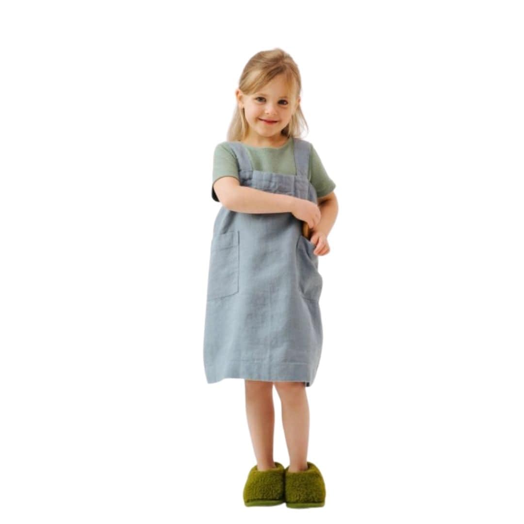 Child wearing Fog Blue Apron - front view