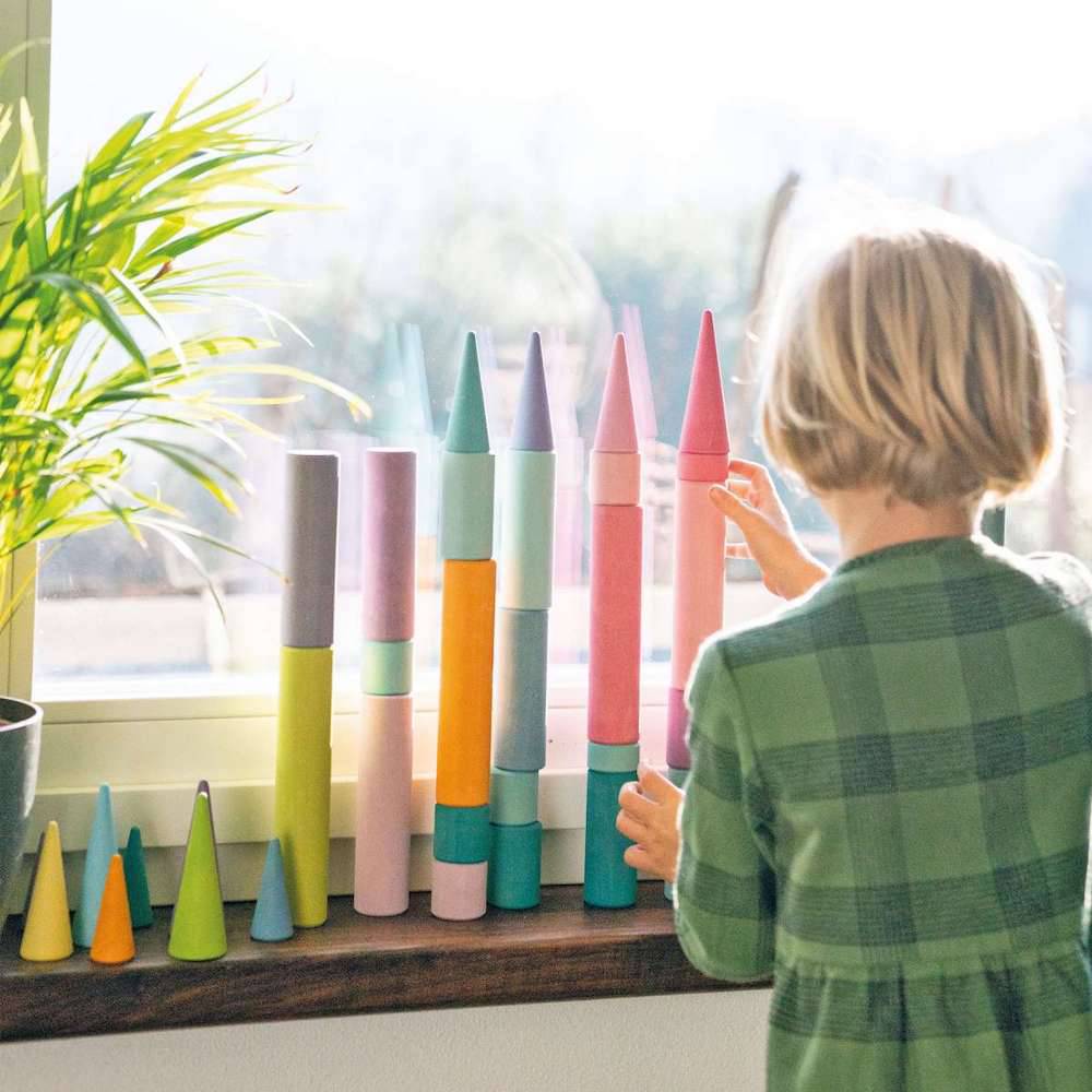 Grimm's Spiel & Holz Pastel Building Rollers in Play
