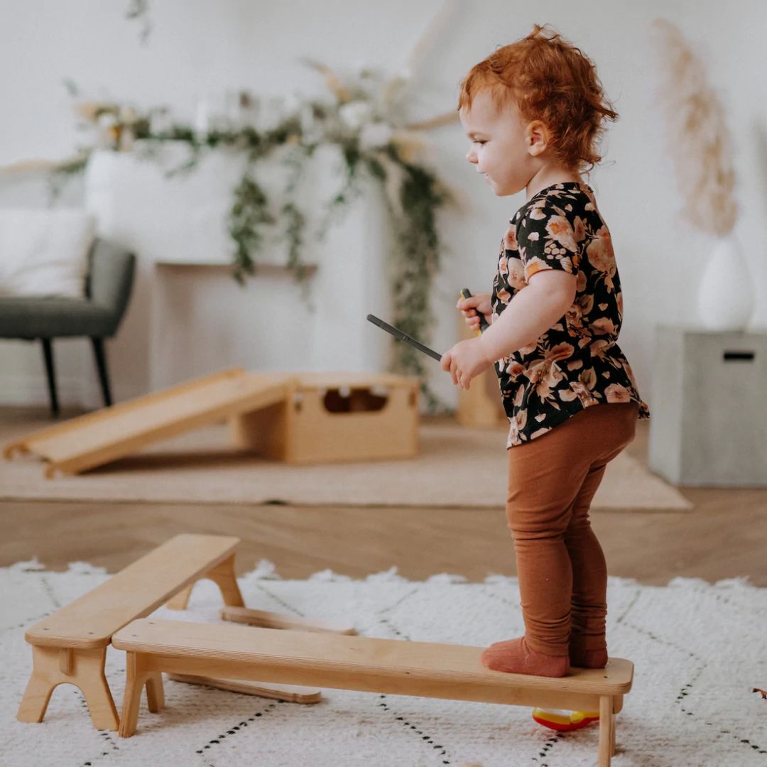 All Circles- Wooden Toys- Child balancing on two wooden balance beams- Bella Luna Toys