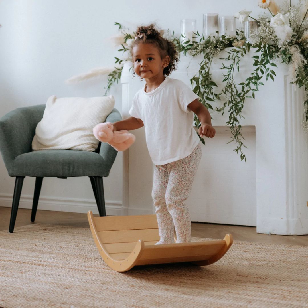 All Circles- Wooden Toys- FSC Certified- Child balancing on wooden balance board rocker-Bella Luna Toys
