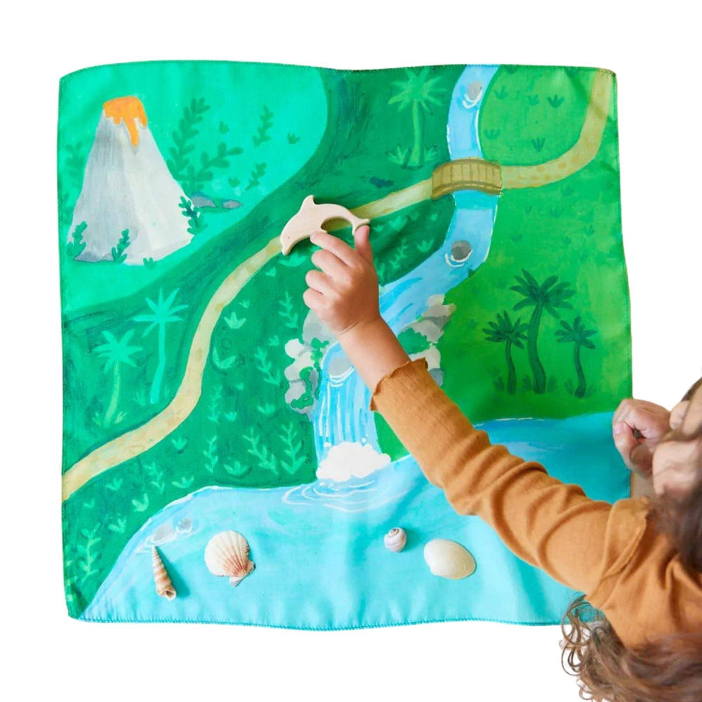 Child playing on mini silk playsilk jungle playmap