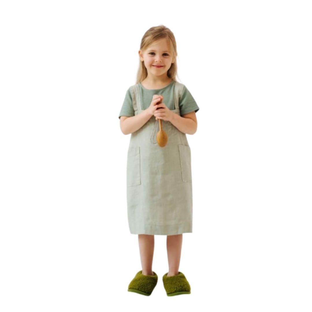 Child wearing Sage Washed Linen Apron - front view