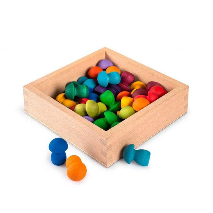 Storage Box with colorful wooden pieces in it