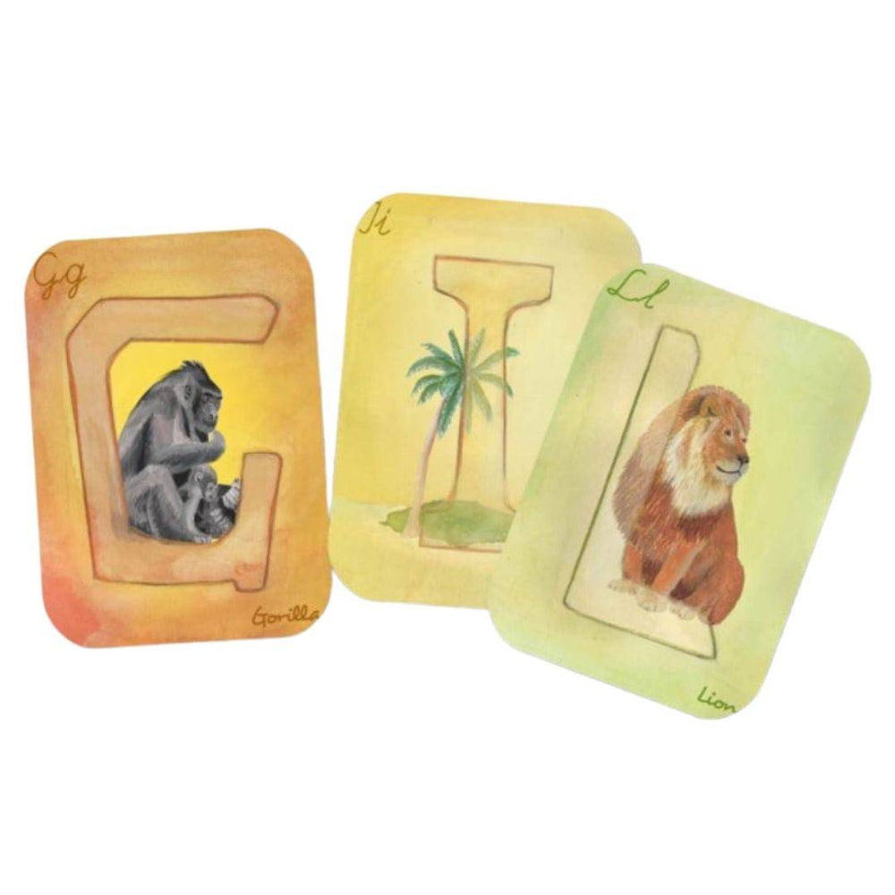 Orange "G" card with a parent and baby gorilla on it; yellow "I" card showing an island, green "L" card showing a lion