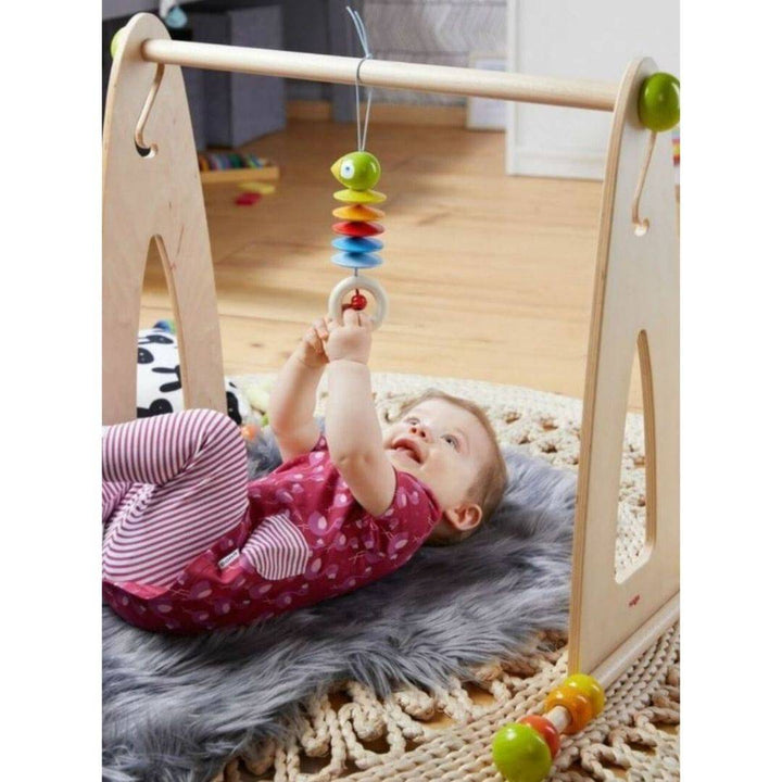 Haba Dangling Wooden Figure Parrot Stroller and Crib Toy - Rattles - Oompa Toys